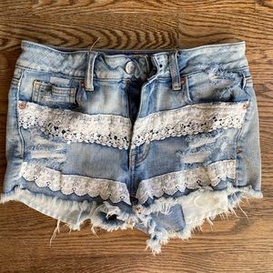 Denim shorts with lace